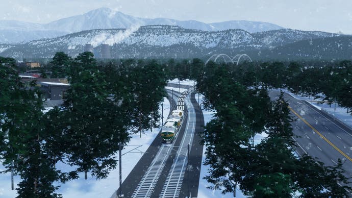 Cities: Skylines 2 header image showing a train moving through a snowy landscape