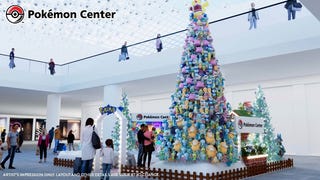 A group of people looking at a massive Christmas tree made up of Pokémon plushies of Psyduck, Squirtle, Ditto and more