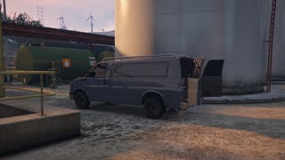 GTA Online, a side view of the Gun Van parked at the Power Station with the back doors open.