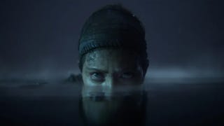 Hellblade 2 official screenshot showing the top half of Senua's face peeping out from above a dark surface of water